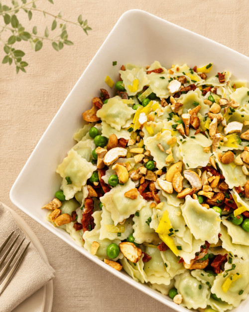 SALADE DE RAVIOLES SIGNATURE, CHORIZO, PETITS POIS (1.2KG)